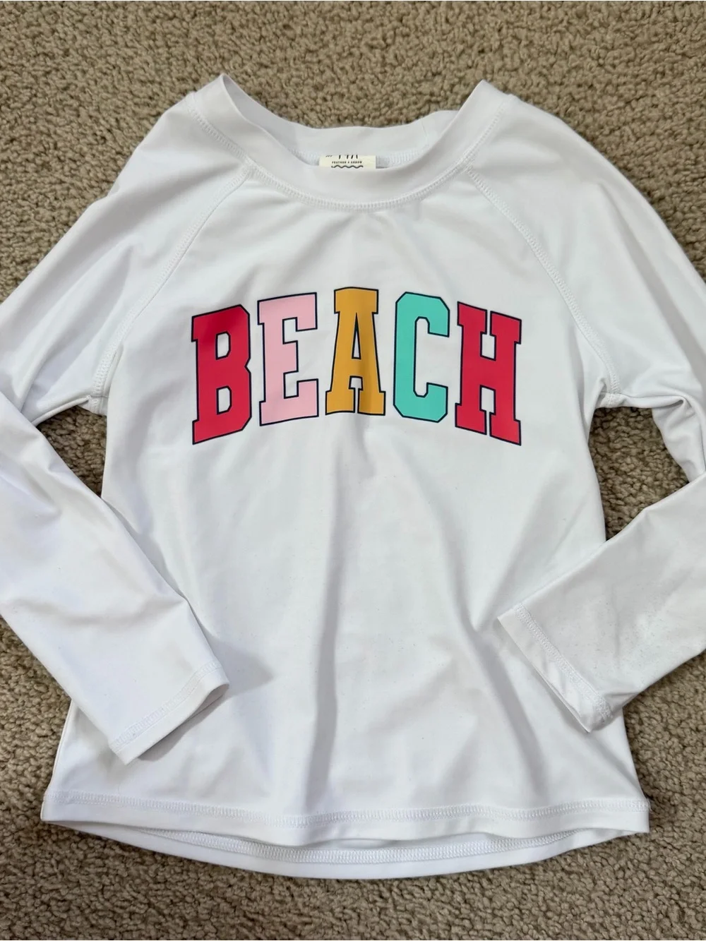 Feather for arrow girls size 6 rash guard BEACH